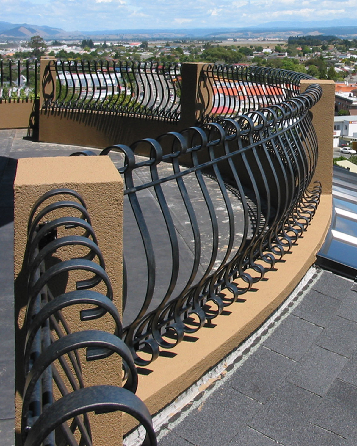 bowed rought iron balustrades from Tasman Forge, NZ